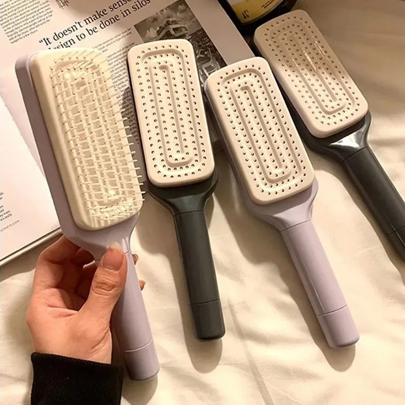 Twistclean - Self-Cleaning Anti-Static Massage Comb Scalable Rotate Lifting Self Cleaning Hairbrush
